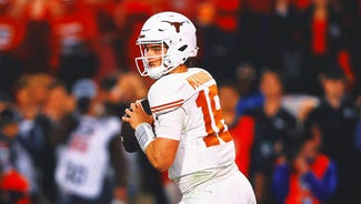 Next Story Image: 2025 College Football Playoff, Bowl Buzz: QB Arch Manning Staying at Texas